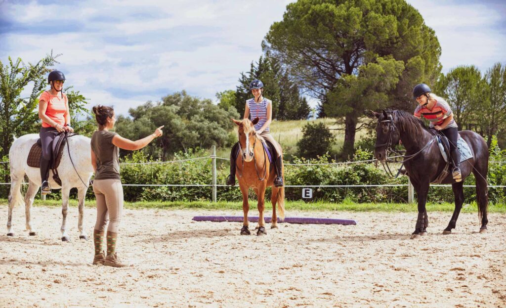 ARIA Certified Riding Instructor Teaching horseback riding lesson